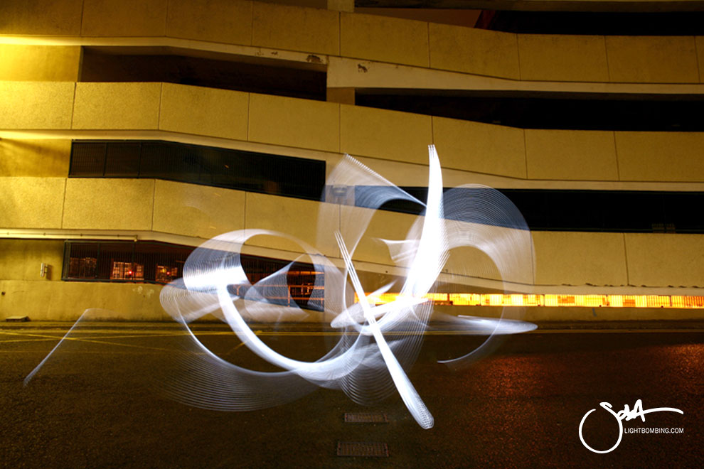 Light Painting Light Graffiti Master Best by Sola Light Sculpture in a city street car park Sola